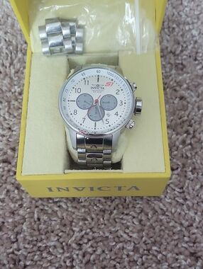 Invicta Silver Stainless Steel Chronograph Watch with White Dial and Red Accents